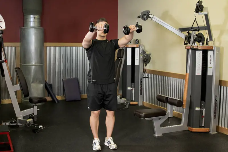 Alternating Deltoid Raise — finish position