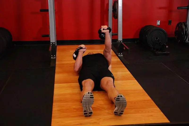 Alternating Floor Press — finish position