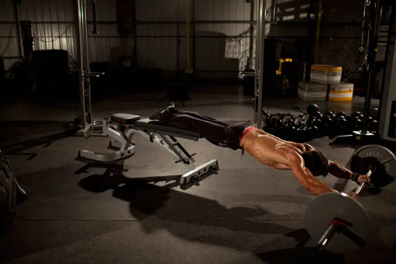 Barbell Rollout from Bench — finish position