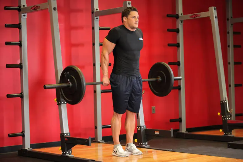 Barbell Shrug Behind The Back — finish position