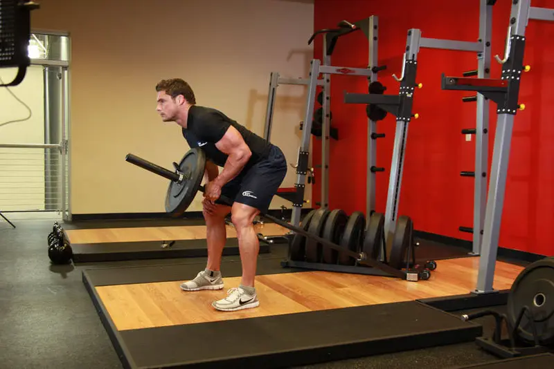 Bent Over One-Arm Long Bar Row — finish position