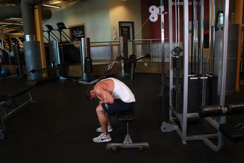 Cable Seated Crunch — finish position