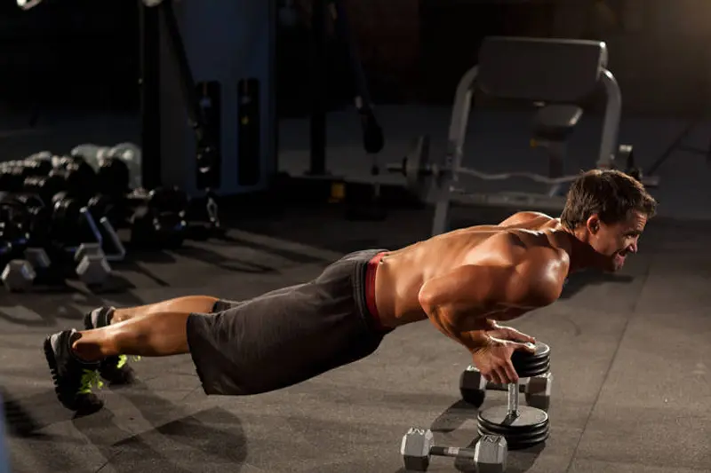 Close-Grip Push-Up off of a Dumbbell — finish position