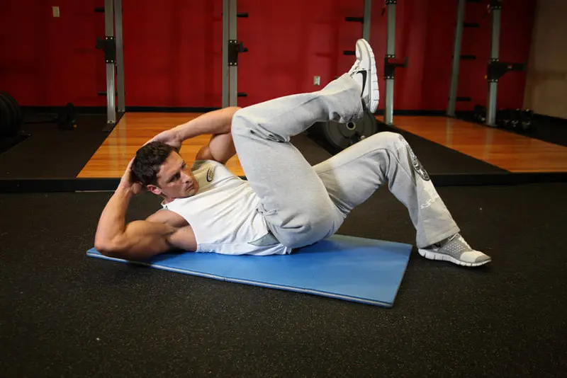 Cross-Body Crunch — finish position