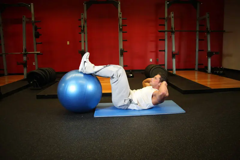 Crunch - Legs On Exercise Ball — finish position