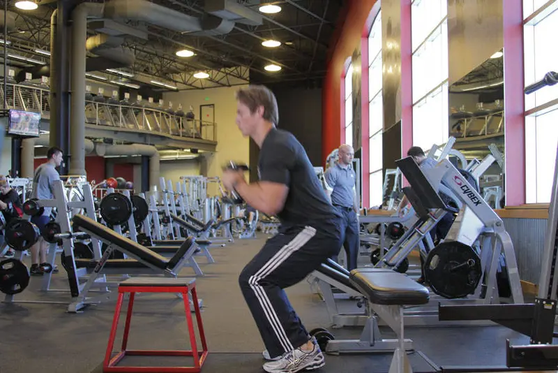 Dumbbell Seated Box Jump — finish position