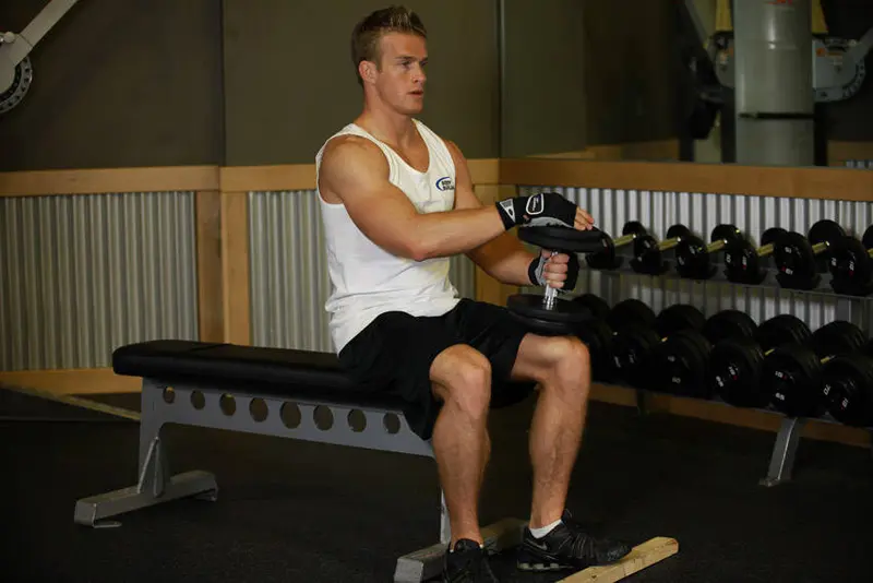 Dumbbell Seated One-Leg Calf Raise — finish position