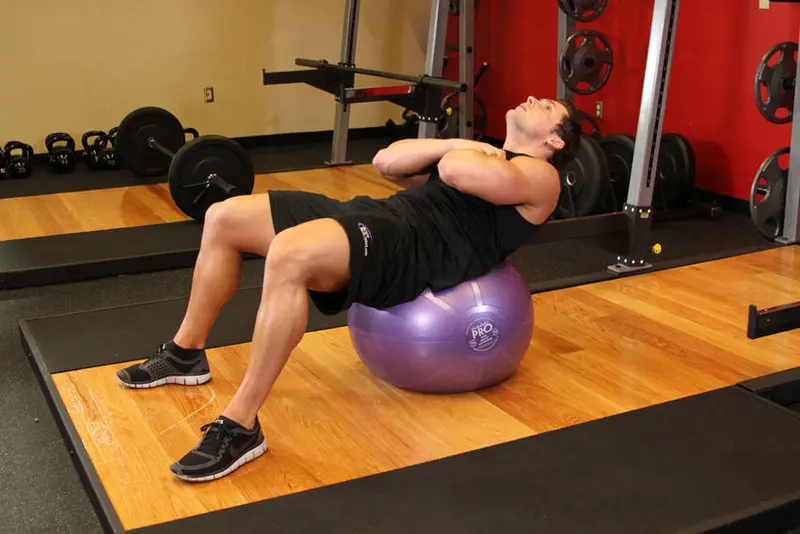 Exercise Ball Crunch — finish position