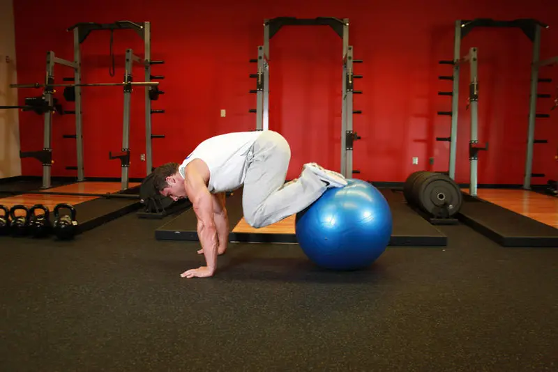 Exercise Ball Pull-In — finish position