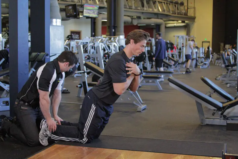 Floor Glute-Ham Raise — finish position