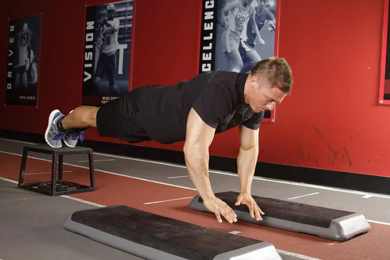 Incline Push-Up Depth Jump — finish position