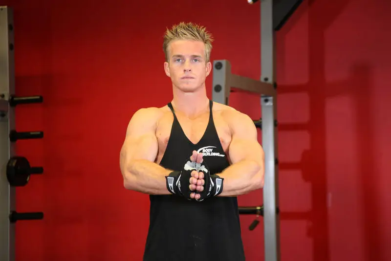 Isometric Chest Squeezes — finish position