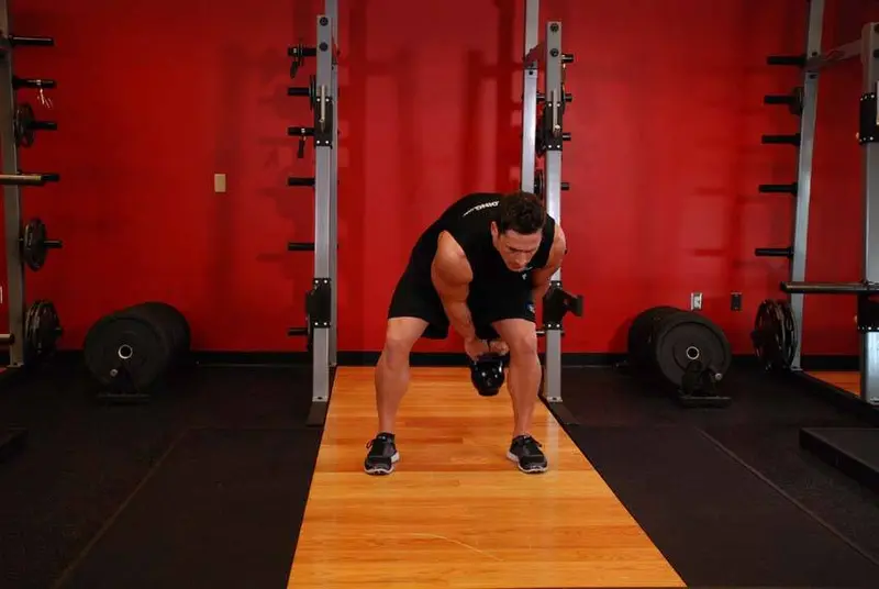 Kettlebell Pass Between The Legs — finish position