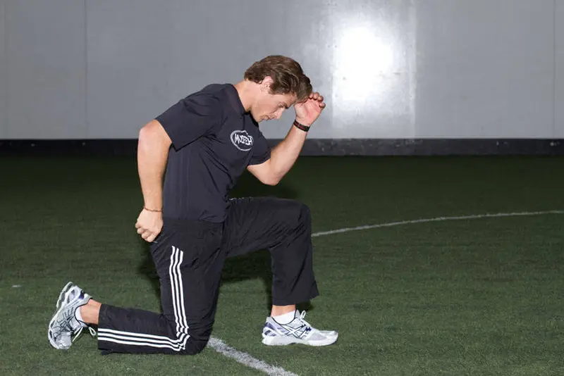 Kneeling Arm Drill — finish position