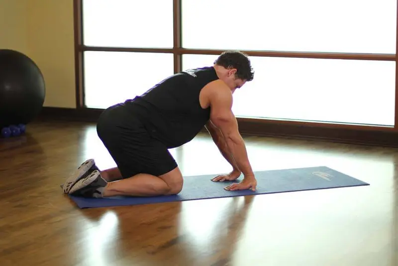 Kneeling Forearm Stretch — finish position