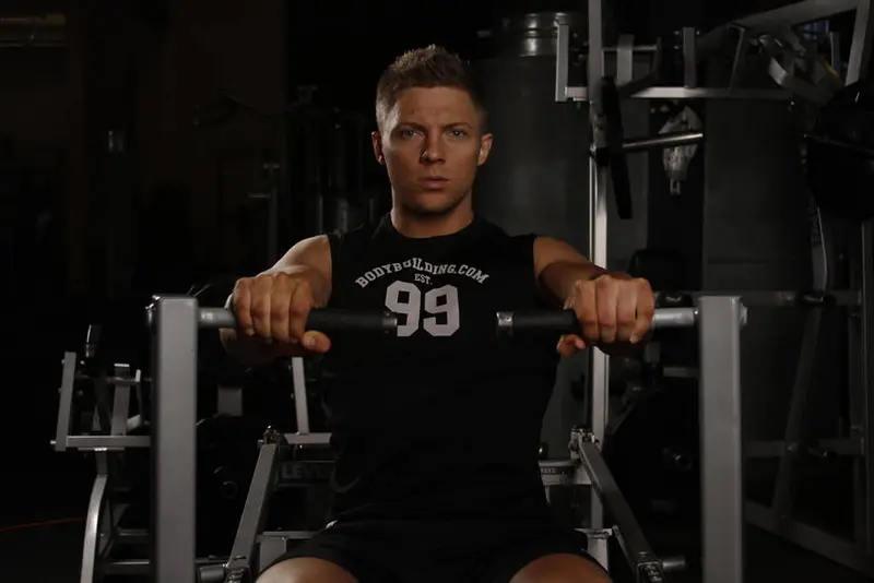 Leverage Chest Press — finish position