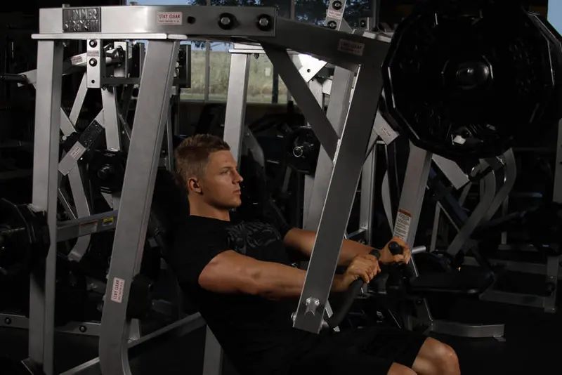 Leverage Decline Chest Press — finish position