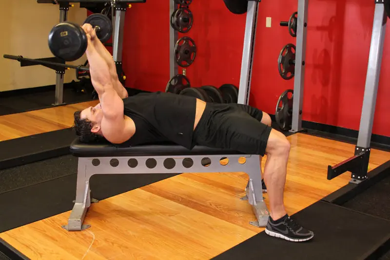Lying Close-Grip Barbell Triceps Extension Behind The Head — finish position