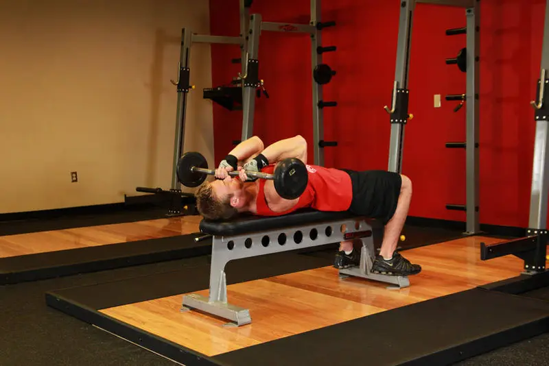 Lying Close-Grip Barbell Triceps Press To Chin — finish position