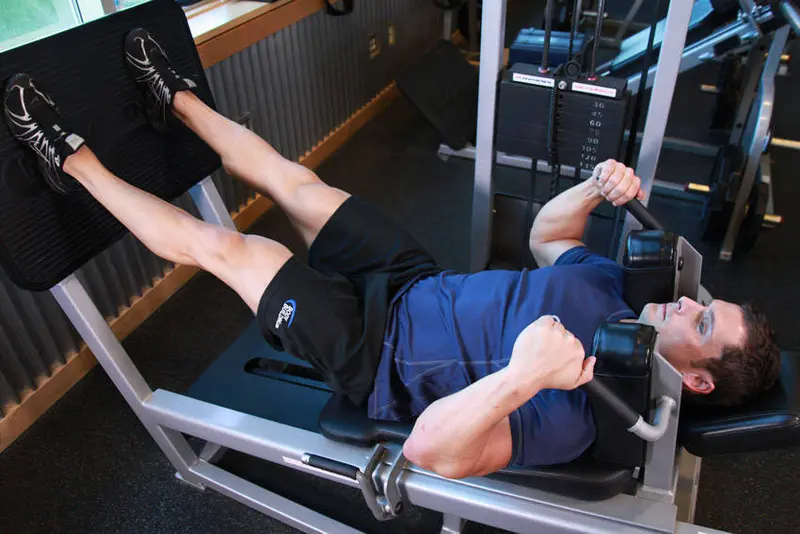 Lying Machine Squat — finish position