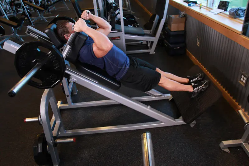 Narrow Stance Hack Squats — finish position