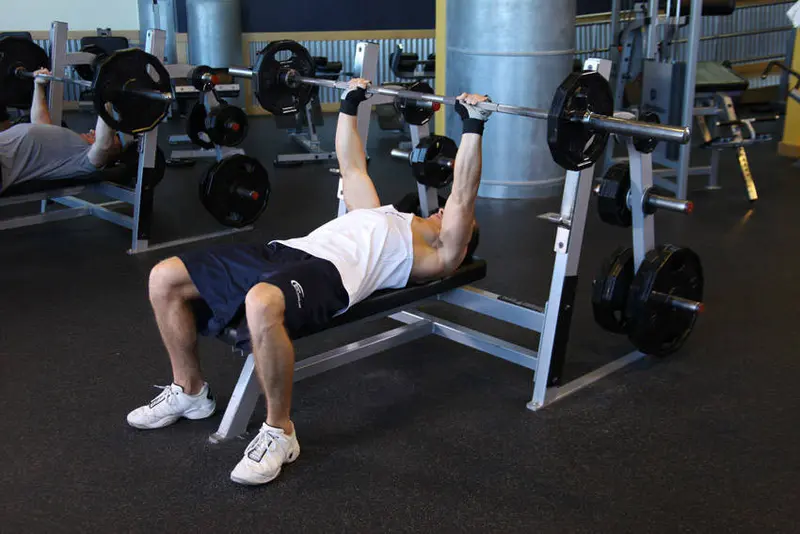 Neck Press — finish position