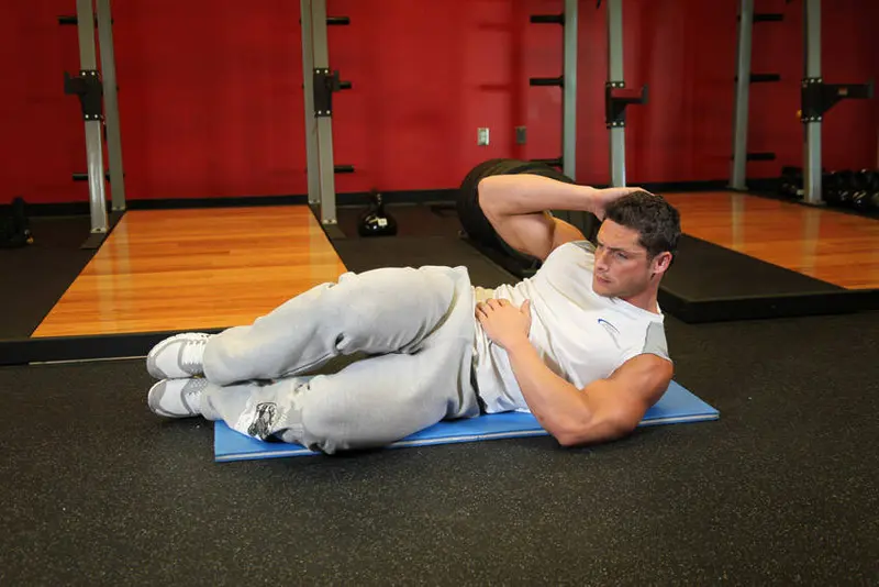 Oblique Crunches - On The Floor — finish position