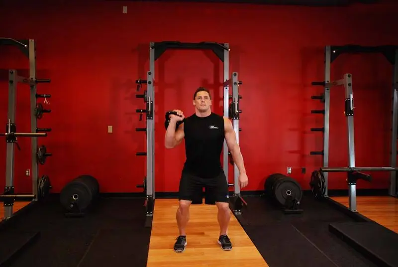 One-Arm Kettlebell Jerk — finish position