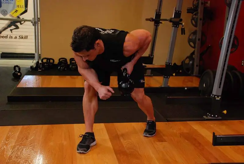 One-Arm Kettlebell Row — finish position