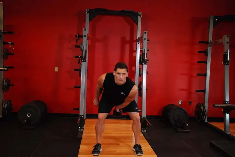 One-Arm Kettlebell Swings — finish position