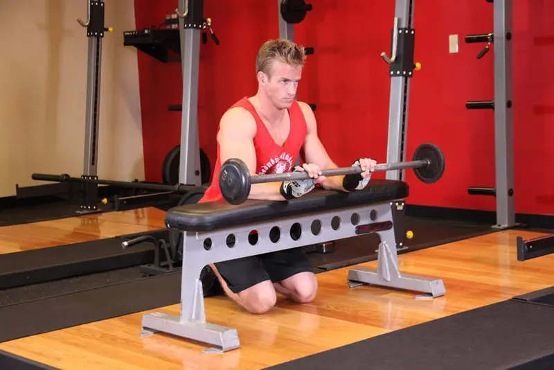 Palms-Down Wrist Curl Over A Bench — finish position