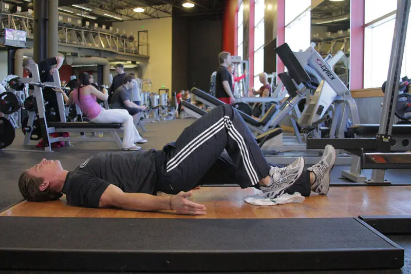 Platform Hamstring Slides — finish position