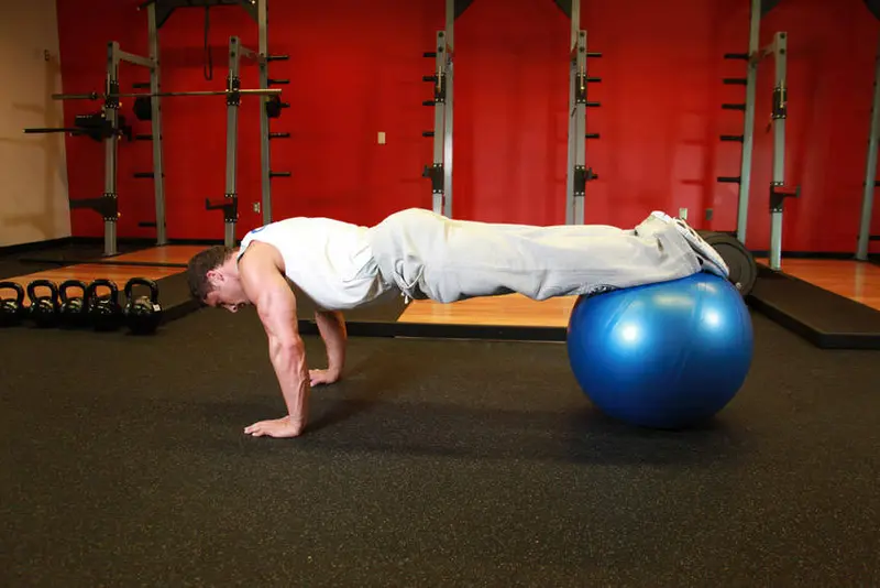 Push-Ups With Feet On An Exercise Ball — finish position