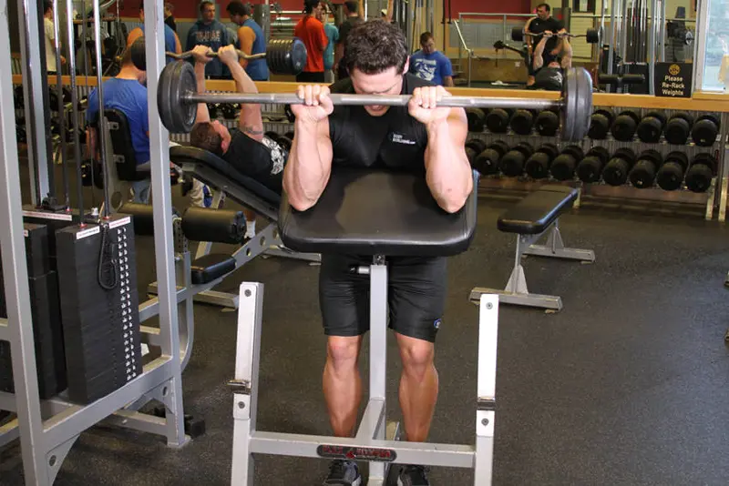 Reverse Barbell Preacher Curls — finish position