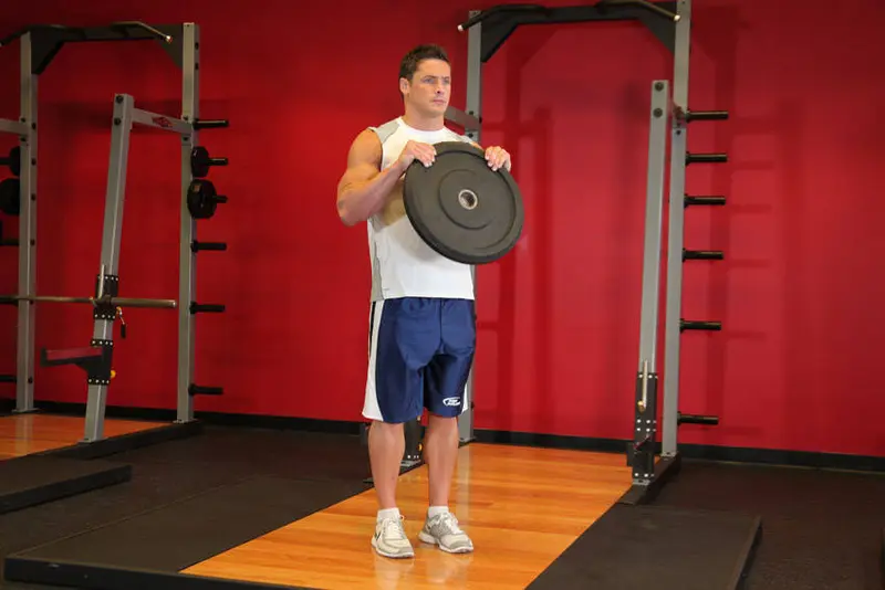 Reverse Plate Curls — finish position