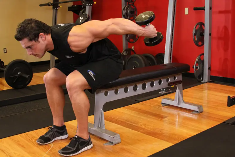 Seated Bent-Over Two-Arm Dumbbell Triceps Extension — finish position