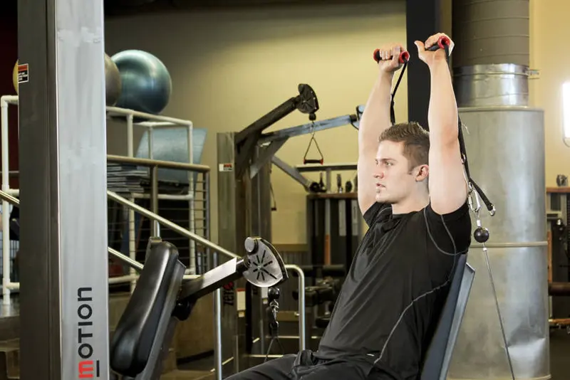 Seated Cable Shoulder Press — finish position