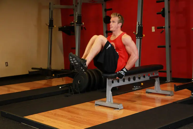 Seated Flat Bench Leg Pull-In — finish position