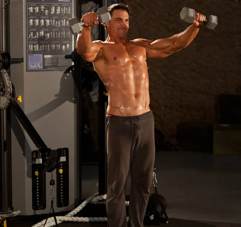 Side Laterals to Front Raise — finish position