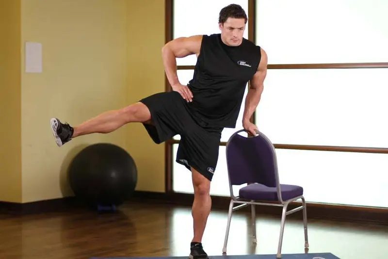 Side Leg Raises — finish position