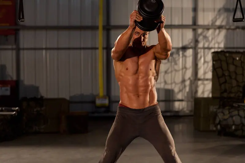 Single Dumbbell Raise — finish position
