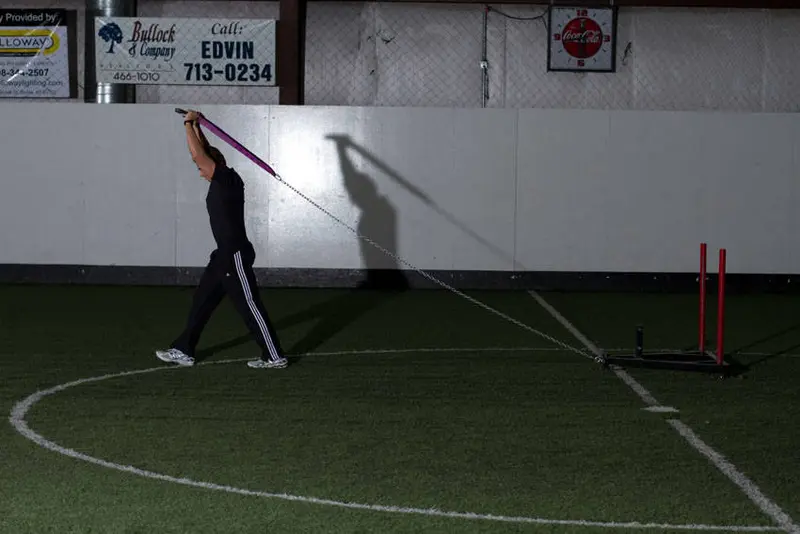 Sled Overhead Triceps Extension — finish position