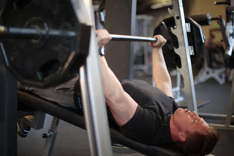 Smith Machine Decline Press — finish position
