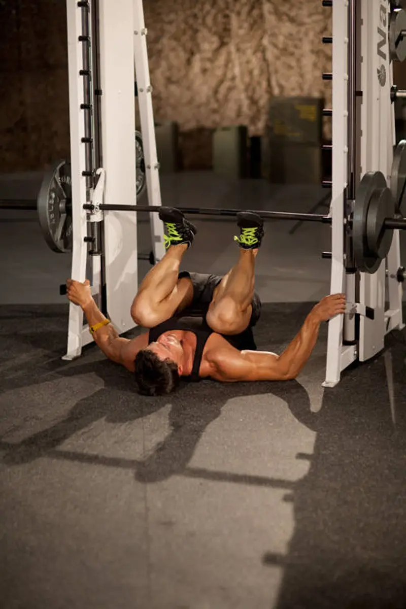 Smith Machine Leg Press — finish position