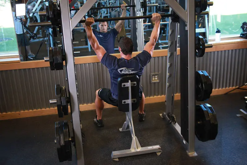 Smith Machine Overhead Shoulder Press — finish position