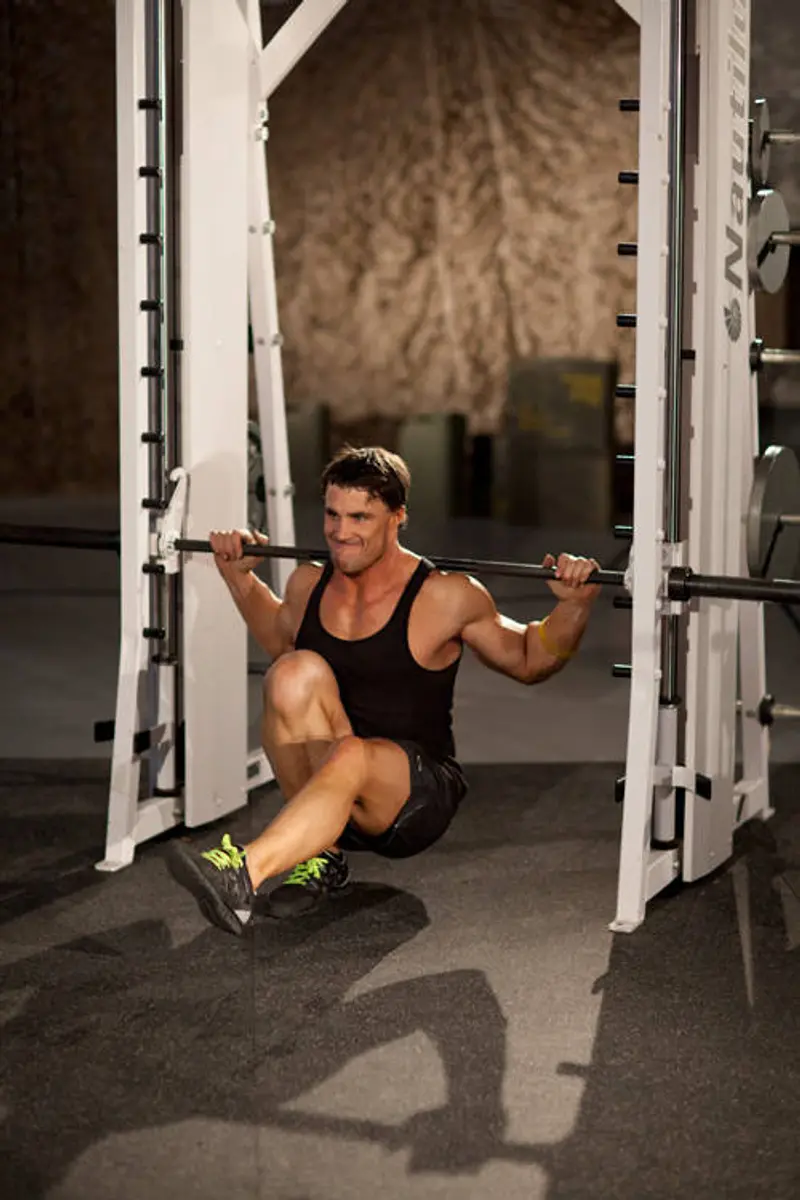 Smith Machine Pistol Squat — finish position