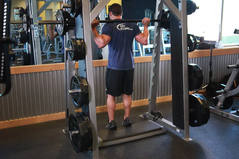 Smith Machine Reverse Calf Raises — finish position