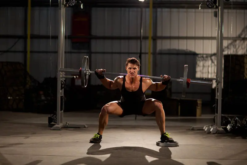 Squat with Plate Movers — finish position