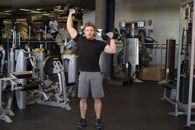 Standing Alternating Dumbbell Press — finish position