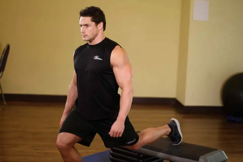 Standing Elevated Quad Stretch — finish position